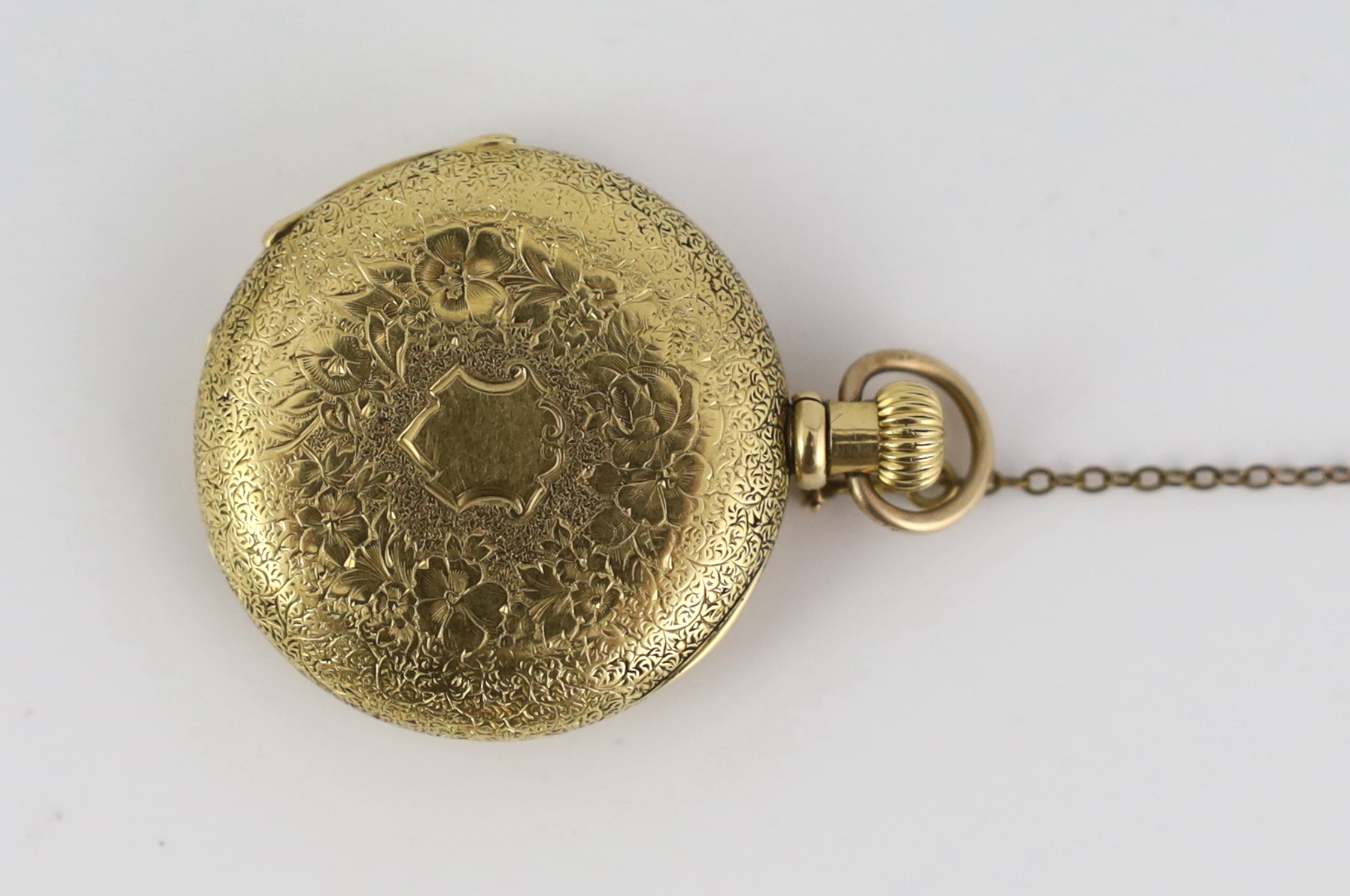 An early 20th century engraved 18ct gold and pink guilloche enamel Patek Philippe keyless fob watch